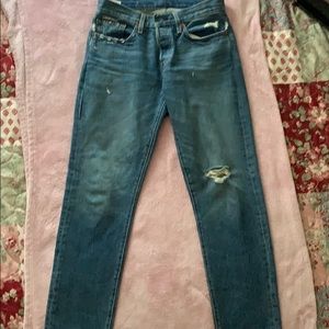 501 Tapered light wash distressed Levi’s